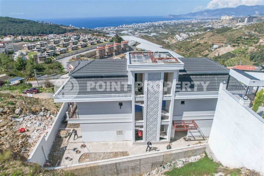 Luxury duplex villa with a total living area of 492 m2 under construction, Kargicak area-id-4164-photo-32