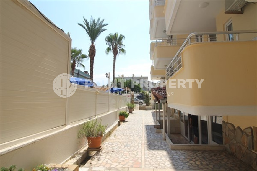 One bedroom apartment, 55m², in a complex with a swimming pool 100m from the sea in Oba, Alanya.-id-1571-photo-26