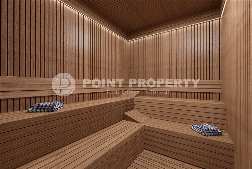 Новый инвестиционный проект - элитный жилой комплекс на самом берегу Средиземного моря, в центре популярного района Аланьи - Махмутлар-id-7398-фото-9