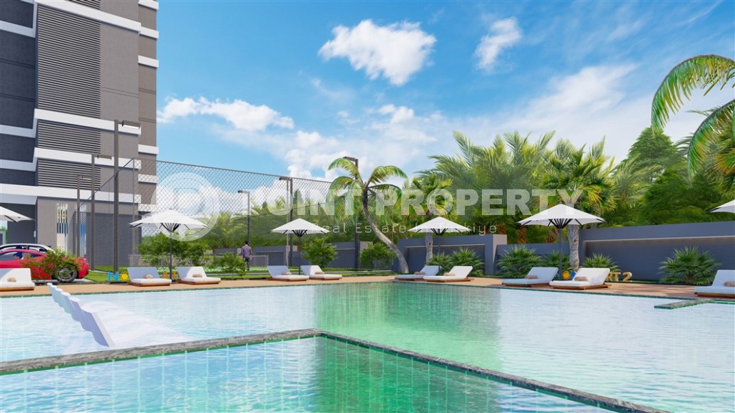 Новый инвестиционный проект - элитный жилой комплекс на самом берегу Средиземного моря, в центре популярного района Аланьи - Махмутлар-id-7398-фото-17