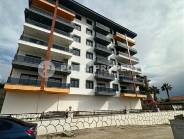 Новая квартира с чистовой отделкой в 750 метрах от моря, в спокойном районе Аланьи - Демирташ-id-7401-фото-1