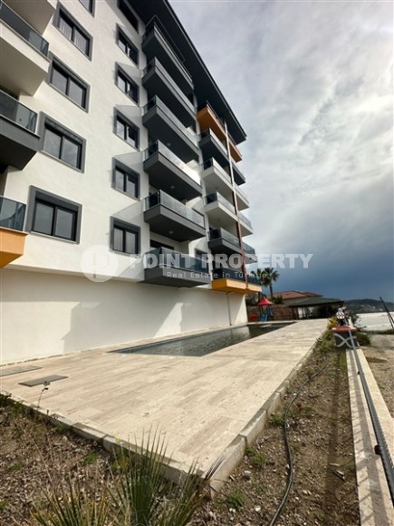 Новая квартира с чистовой отделкой в 750 метрах от моря, в спокойном районе Аланьи - Демирташ-id-7401-фото-11