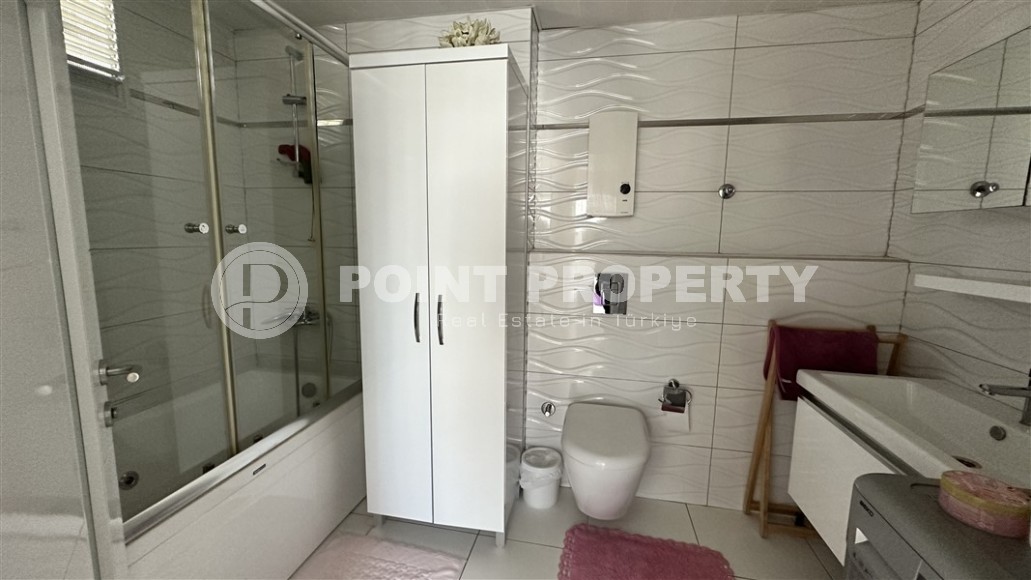 Spacious linear apartment 3+1 700 meters from the sea, in the center of the modern area of Alanya - Cikcilli-id-7407-photo-9