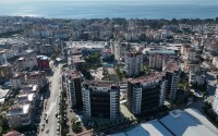 Просторная линейная квартира 3+1 в 700 метрах от моря, в центре современного района Аланьи - Джикджилли-id-7407-фото-19