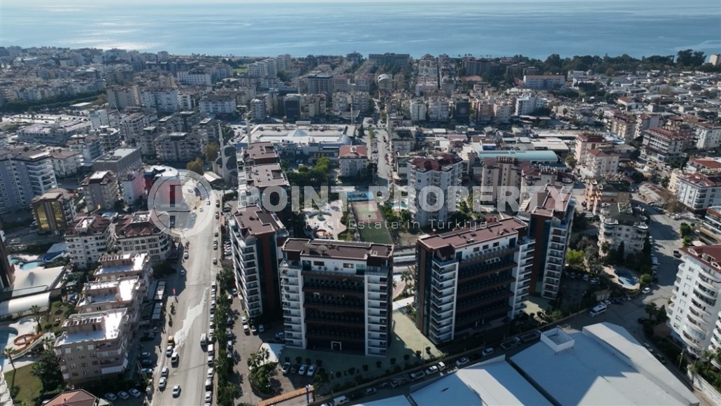 Spacious linear apartment 3+1 700 meters from the sea, in the center of the modern area of Alanya - Cikcilli-id-7407-photo-19