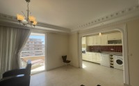 Furnished apartment 2+1 with panoramic views of the city and the sea, 600 meters from the sea, in the center of Mahmutlar-id-7418-photo-6