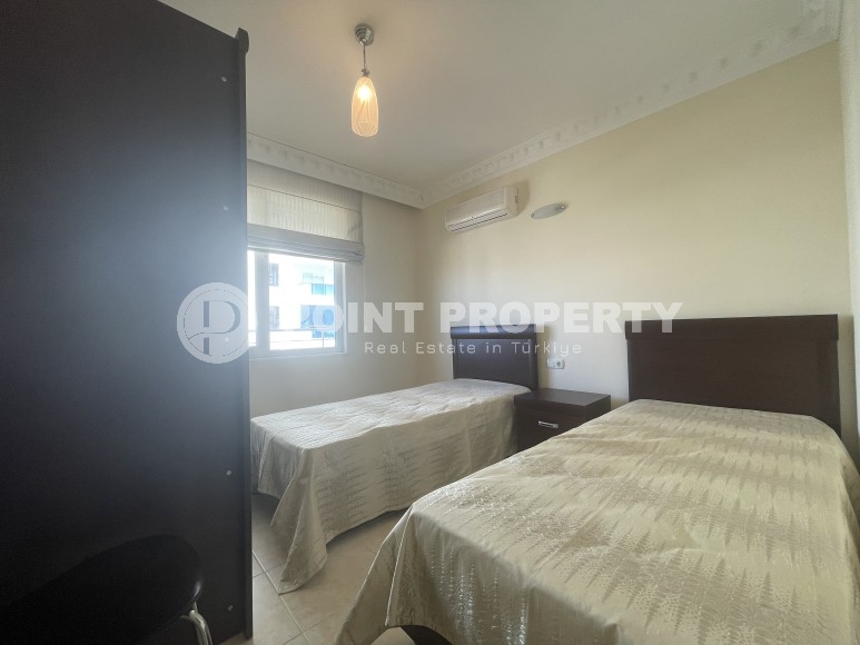 Furnished apartment 2+1 with panoramic views of the city and the sea, 600 meters from the sea, in the center of Mahmutlar-id-7418-photo-11