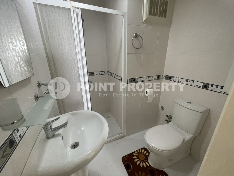 Furnished apartment 2+1 with panoramic views of the city and the sea, 600 meters from the sea, in the center of Mahmutlar-id-7418-photo-17