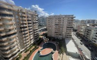 Furnished apartment 2+1 with panoramic views of the city and the sea, 600 meters from the sea, in the center of Mahmutlar-id-7418-photo-23