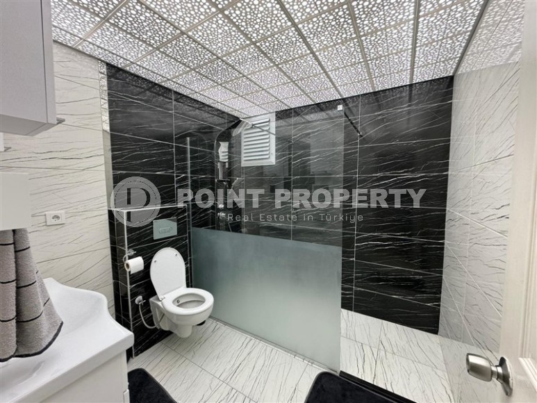 Панорамная двухуровневая квартира 4+2 с видом на море и горы, в центре популярного района Аланьи - Махмутлар-id-7421-фото-12