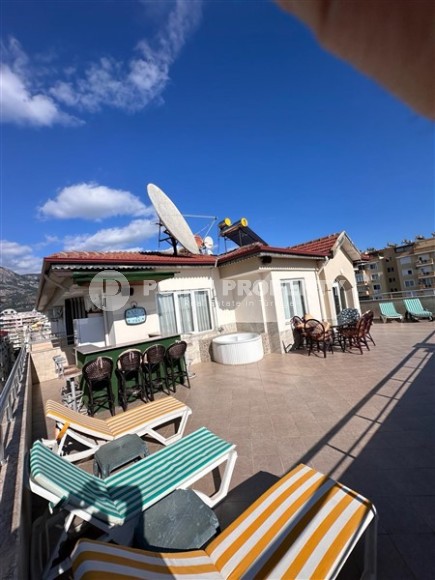 Панорамная двухуровневая квартира 4+2 с видом на море и горы, в центре популярного района Аланьи - Махмутлар-id-7421-фото-14