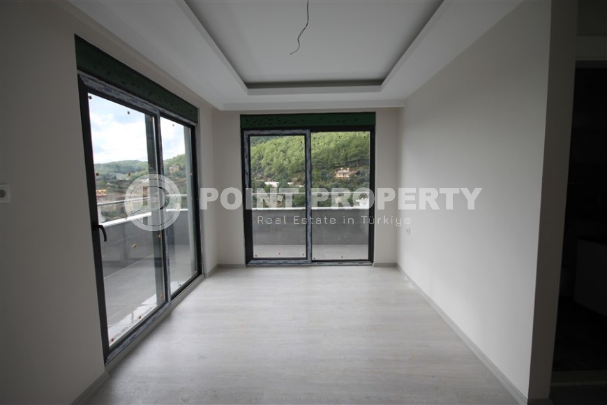 New apartment with fine finishing four kilometers from the sea, in a green, environmentally friendly area of Alanya - Ciplakli-id-7430-photo-6