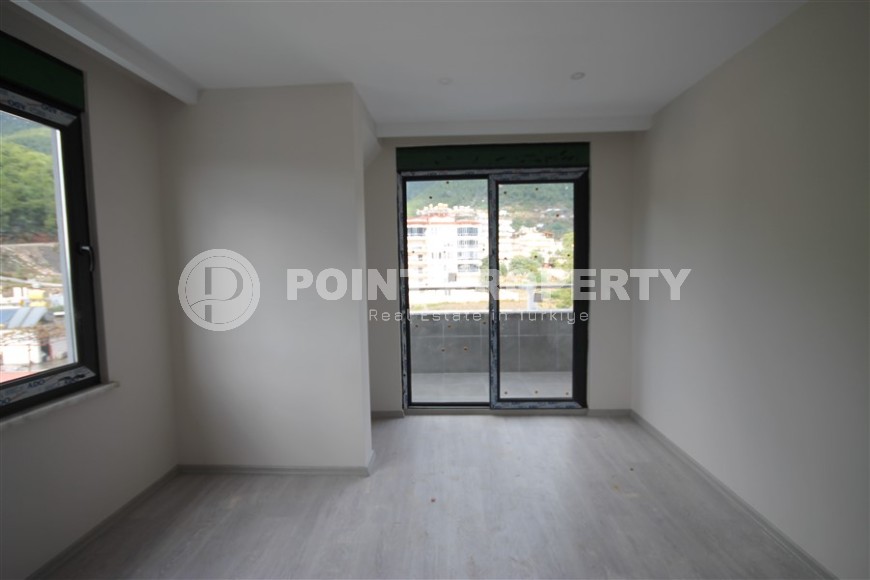 New apartment with fine finishing four kilometers from the sea, in a green, environmentally friendly area of Alanya - Ciplakli-id-7430-photo-7
