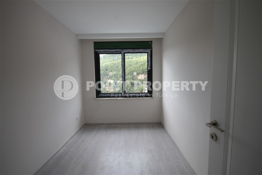 New apartment with fine finishing four kilometers from the sea, in a green, environmentally friendly area of Alanya - Ciplakli-id-7430-photo-8