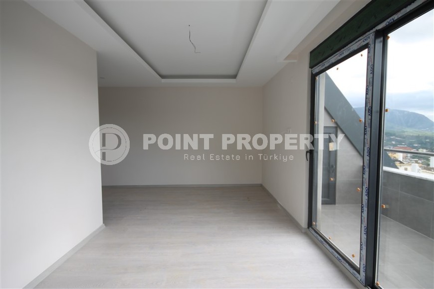 New apartment with fine finishing four kilometers from the sea, in a green, environmentally friendly area of Alanya - Ciplakli-id-7430-photo-10