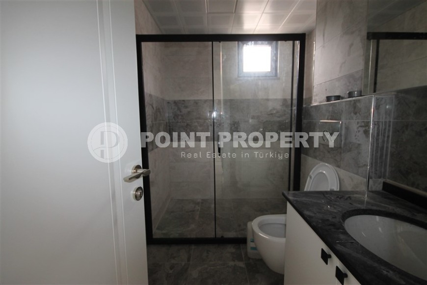 New apartment with fine finishing four kilometers from the sea, in a green, environmentally friendly area of Alanya - Ciplakli-id-7430-photo-15