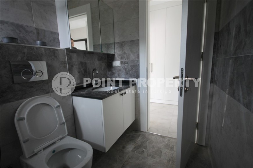 New apartment with fine finishing four kilometers from the sea, in a green, environmentally friendly area of Alanya - Ciplakli-id-7430-photo-16