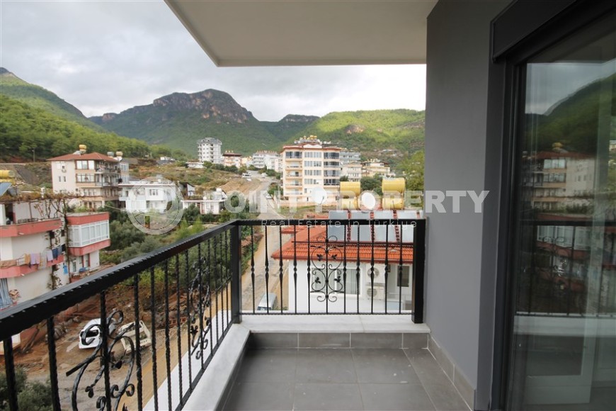 New apartment with fine finishing four kilometers from the sea, in a green, environmentally friendly area of Alanya - Ciplakli-id-7430-photo-21