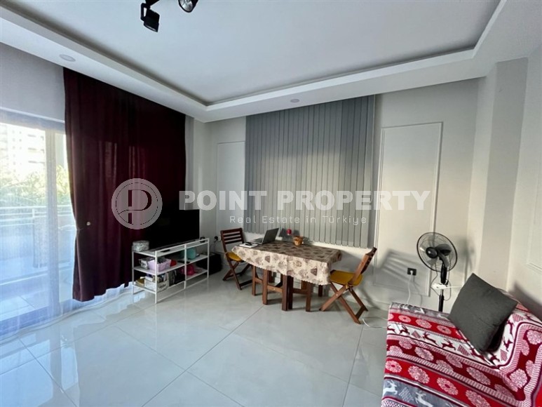Ready-to-move-in apartment 1+1, on an area of 55 m2, within walking distance from the center of Mahmutlar-id-7431-photo-2