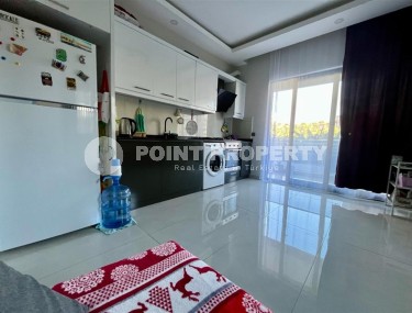 Ready-to-move-in apartment 1+1, on an area of 55 m2, within walking distance from the center of Mahmutlar-id-7431-photo-4