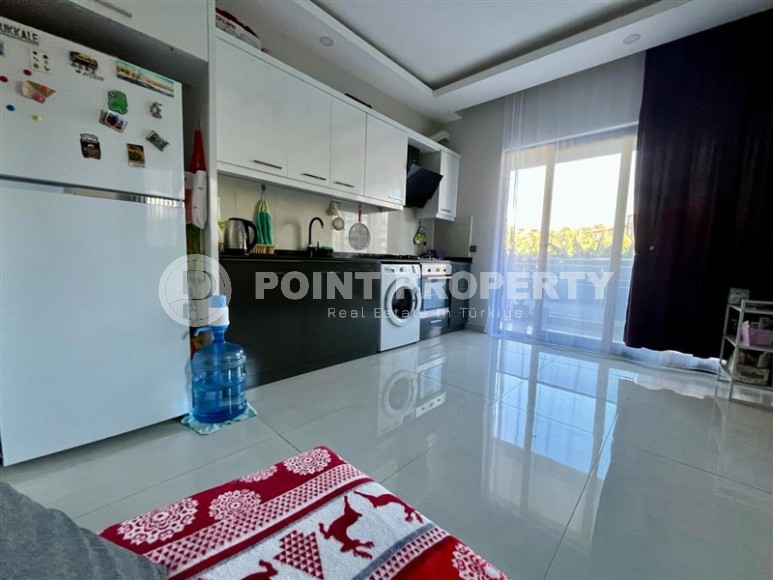 Ready-to-move-in apartment 1+1, on an area of 55 m2, within walking distance from the center of Mahmutlar-id-7431-photo-4