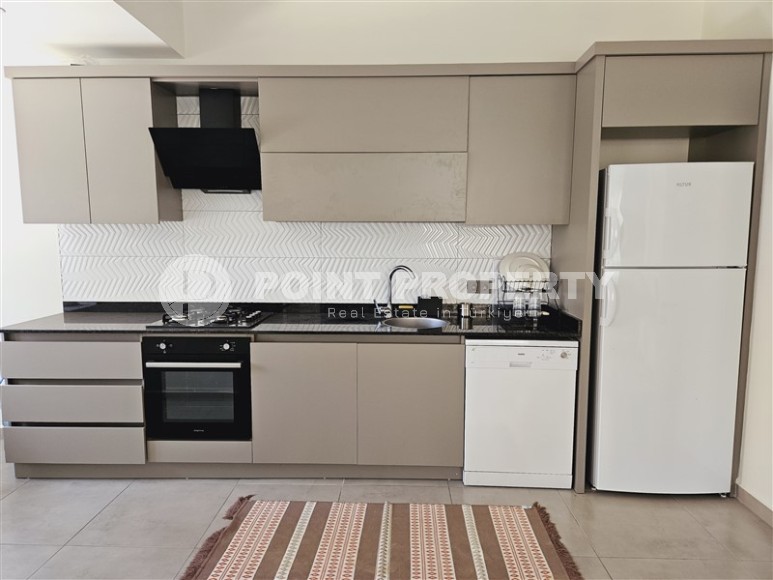 Ready-to-move-in apartment with furniture and household appliances, in a modern area of Alanya - Mahmutlar-id-7439-photo-4