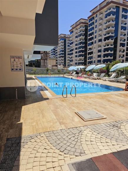Ready-to-move-in apartment with furniture and household appliances, in a modern area of Alanya - Mahmutlar-id-7439-photo-18