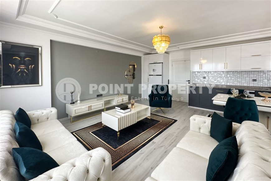 Просторная квартира с современным дизайном, комфортабельной мебелью и всей необходимой бытовой техникой, в центре района Тосмур-id-7440-фото-3