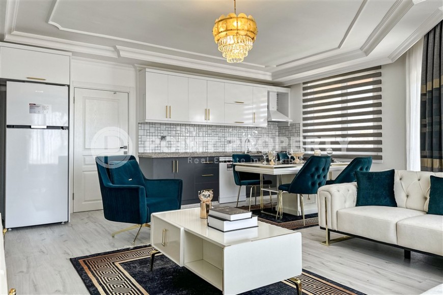 Просторная квартира с современным дизайном, комфортабельной мебелью и всей необходимой бытовой техникой, в центре района Тосмур-id-7440-фото-4