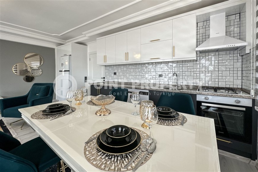 Просторная квартира с современным дизайном, комфортабельной мебелью и всей необходимой бытовой техникой, в центре района Тосмур-id-7440-фото-5