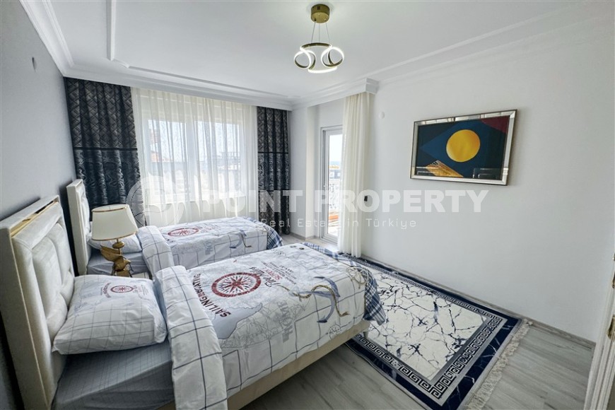 Просторная квартира с современным дизайном, комфортабельной мебелью и всей необходимой бытовой техникой, в центре района Тосмур-id-7440-фото-7