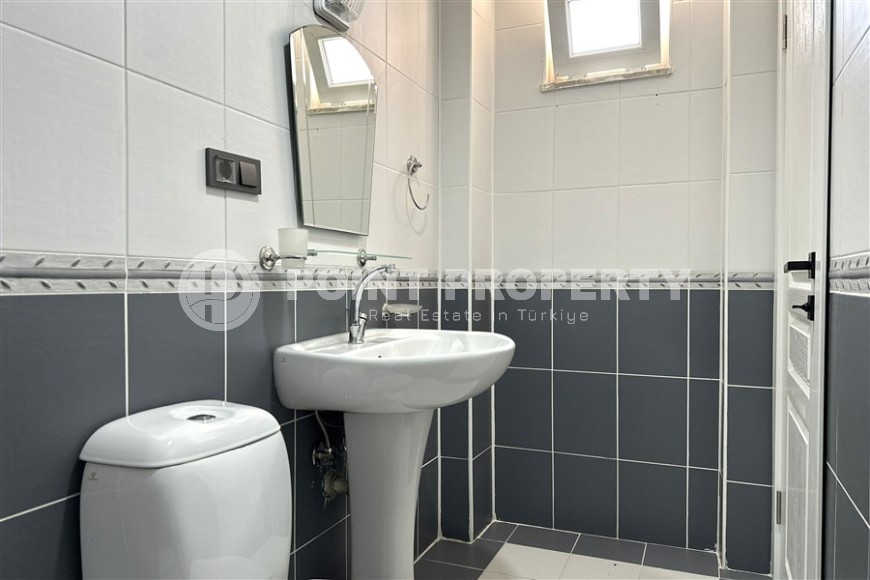 Просторная квартира с современным дизайном, комфортабельной мебелью и всей необходимой бытовой техникой, в центре района Тосмур-id-7440-фото-12