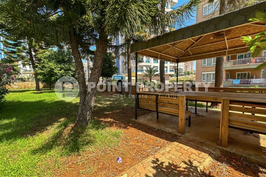 Просторная квартира с современным дизайном, комфортабельной мебелью и всей необходимой бытовой техникой, в центре района Тосмур-id-7440-фото-17