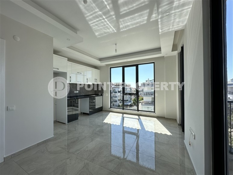 Небольшая квартира 1+1 и пентхаус 3+1 в 550 метрах от моря, в современном районе Аланьи - Нижняя Оба-id-7450-фото-2