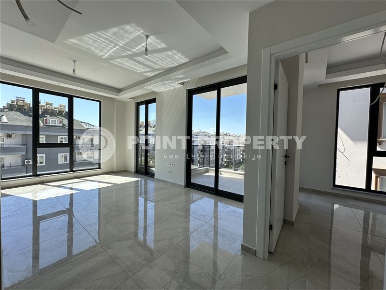 Небольшая квартира 1+1 и пентхаус 3+1 в 550 метрах от моря, в современном районе Аланьи - Нижняя Оба-id-7450-фото-3