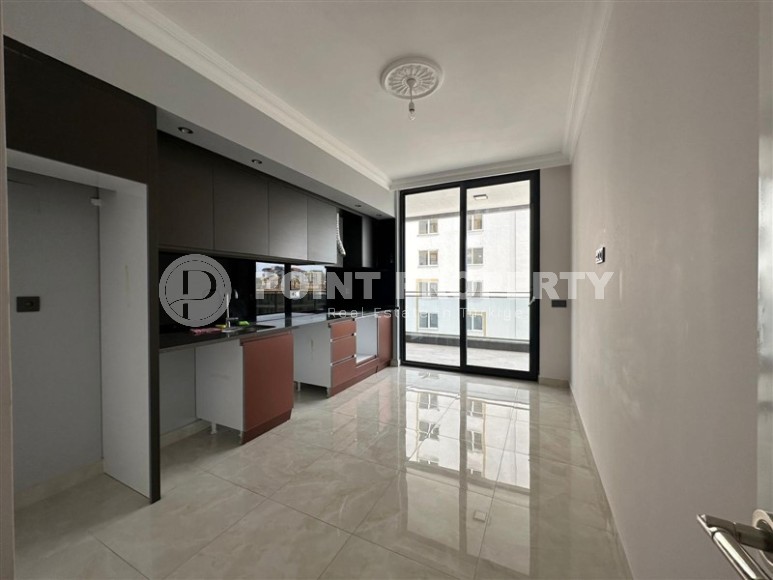 Spacious 2+1 apartment with a total area of 100 m2, in the center of the popular area of Alanya - Mahmutlar-id-7456-photo-2