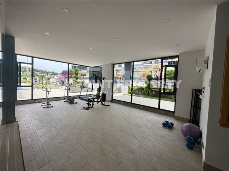 Spacious 2+1 apartment with a total area of 100 m2, in the center of the popular area of Alanya - Mahmutlar-id-7456-photo-8