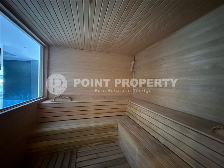 Spacious 2+1 apartment with a total area of 100 m2, in the center of the popular area of Alanya - Mahmutlar-id-7456-photo-10