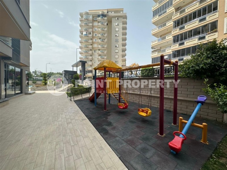 Spacious 2+1 apartment with a total area of 100 m2, in the center of the popular area of Alanya - Mahmutlar-id-7456-photo-15