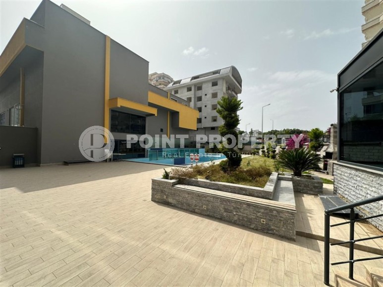 Spacious 2+1 apartment with a total area of 100 m2, in the center of the popular area of Alanya - Mahmutlar-id-7456-photo-17