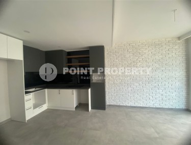 Двухкомнатные апартаменты 60 м2 в строящейся резиденции в 150 метрах от пляжа Клеопатры, центр Аланьи-id-3925-фото-4