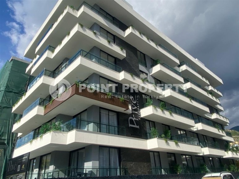 Two-room apartment 60 m2 in a residence under construction 150 meters from Cleopatra Beach, Alanya center-id-3925-photo-21