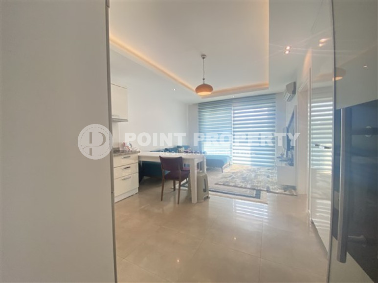 Furnished one bedroom apartment, 55m², in a luxury complex in Mahmutlar, Alanya-id-1576-photo-3