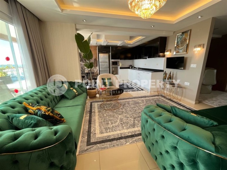 Stylish two-level apartment with designer renovation 800 meters from the sea, in a quiet area of Alanya - Cikcilli-id-7478-photo-2