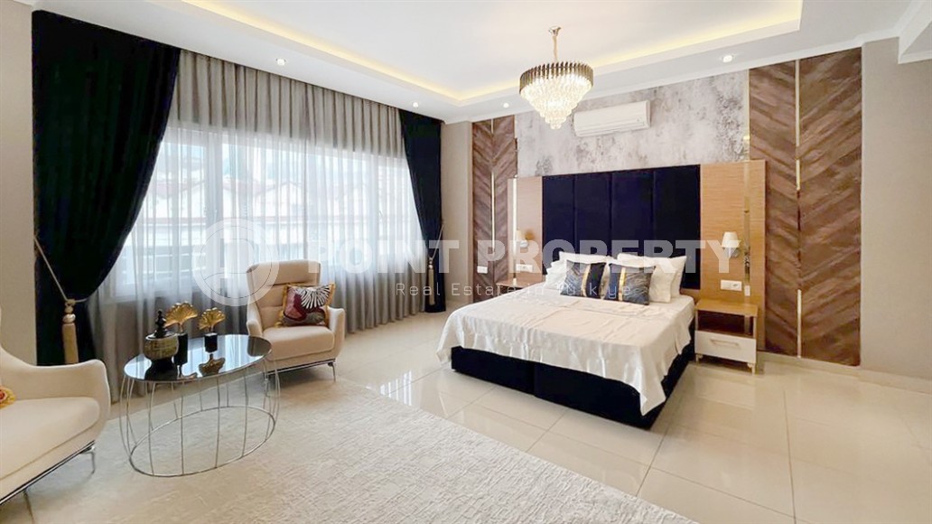 Stylish two-level apartment with designer renovation 800 meters from the sea, in a quiet area of Alanya - Cikcilli-id-7478-photo-5