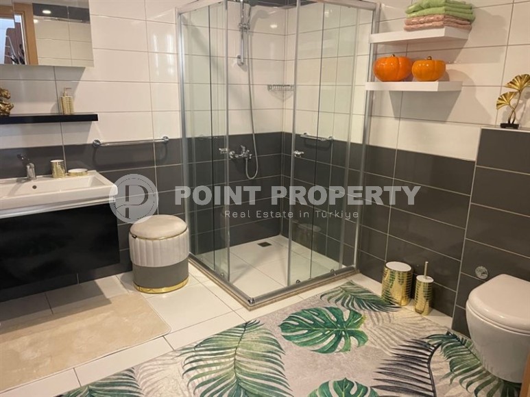 Stylish two-level apartment with designer renovation 800 meters from the sea, in a quiet area of Alanya - Cikcilli-id-7478-photo-12