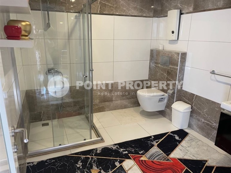 Stylish two-level apartment with designer renovation 800 meters from the sea, in a quiet area of Alanya - Cikcilli-id-7478-photo-13