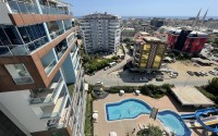 Stylish two-level apartment with designer renovation 800 meters from the sea, in a quiet area of Alanya - Cikcilli-id-7478-photo-24