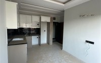 Квартира 1+1 с чистовой отделкой, на 1-м этаже в жилом комплексе 2022 года постройки-id-7483-фото-2