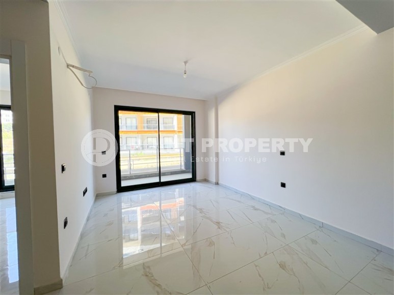 Новая квартира с качественной чистовой отделкой, на 1-м этаже в жилом комплексе с отельной инфраструктурой, построенном в 2022 году-id-7488-фото-2